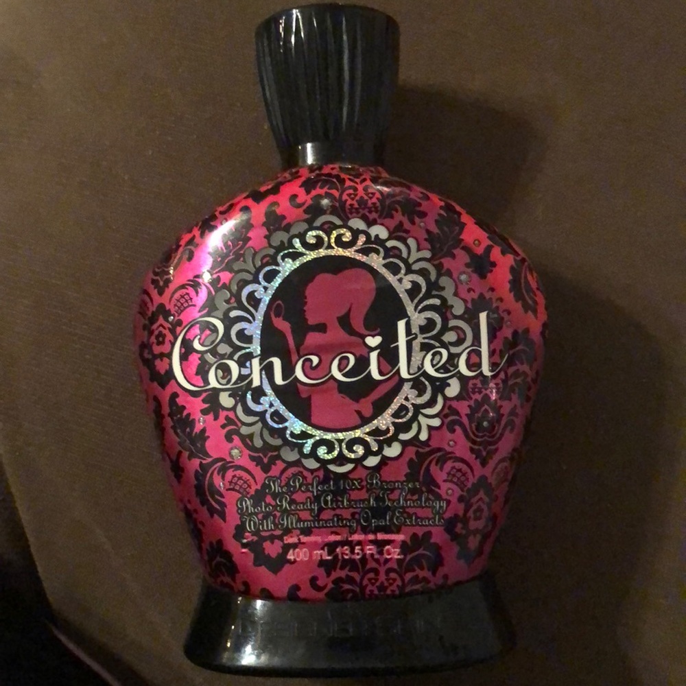 Designer skin tanning lotion